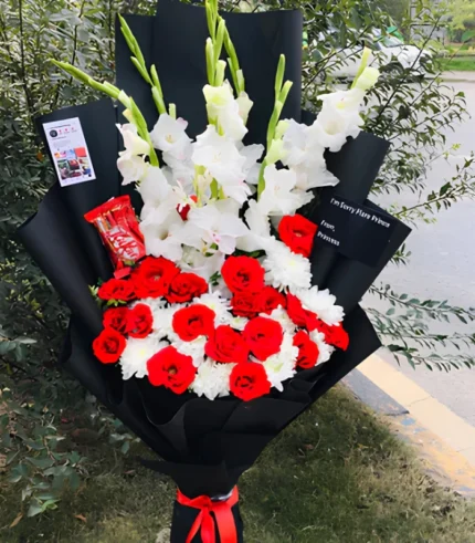 Beautiful flower sorry gift with red roses and white lilies for apology delivery in Pakistan