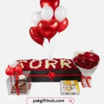 Apology surprise gift with flowers cake balloons and pizza in Pakistan